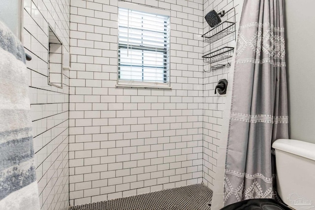 5945 Pamela Dr, Milton, FL 32570 - bathroom with a stall shower and toilet