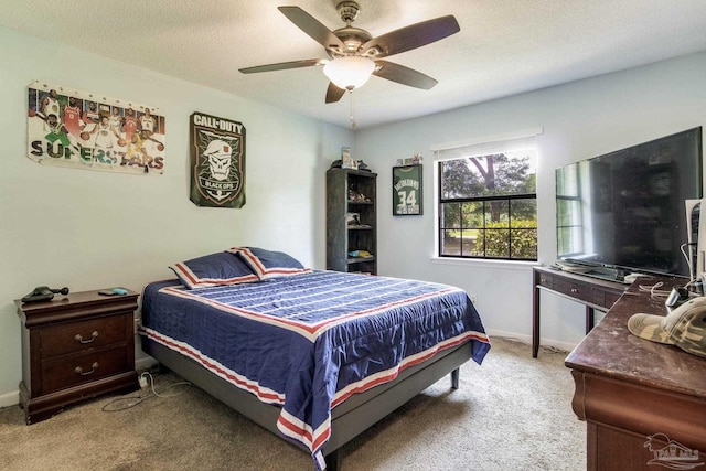 5945 Pamela Dr, Milton, FL 32570 - bedroom featuring light carpet, a ceiling fan, baseboards, and a textured ceiling