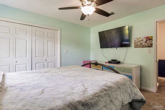 5945 Pamela Dr, Milton, FL 32570 - bedroom featuring a closet, carpet flooring, a ceiling fan, and baseboards