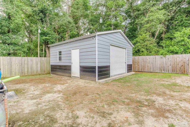 5945 Pamela Dr, Milton, FL 32570 - view of outbuilding featuring a fenced backyard and view of scattered trees