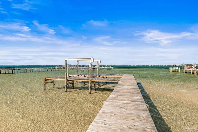 view of jungle gym featuring a water view