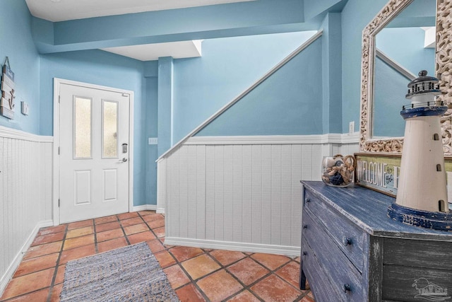 entrance foyer with tile patterned flooring