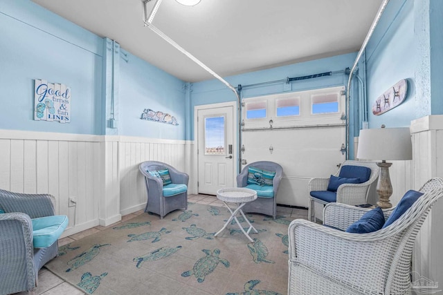 living area with light tile patterned floors