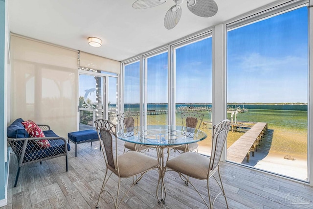 sunroom / solarium with ceiling fan