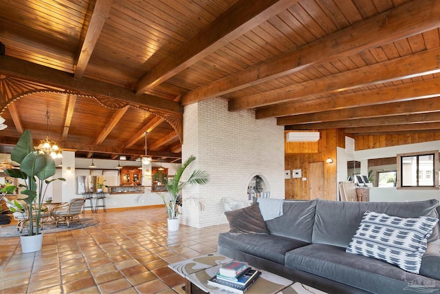 living room featuring beam ceiling, an AC wall unit, wood ceiling, and a chandelier