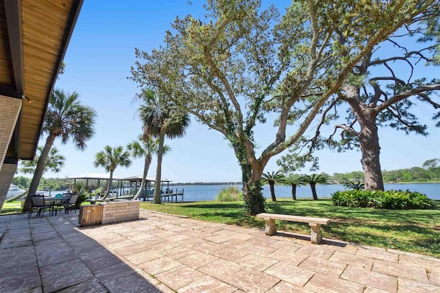 view of patio / terrace with a water view