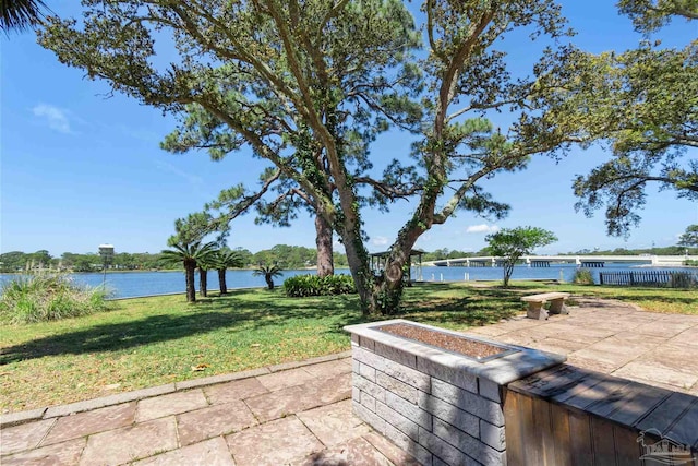 view of patio featuring a water view