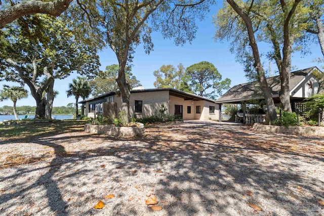 view of front of home featuring a water view