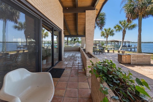 view of patio / terrace featuring a water view