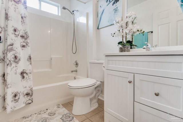 bathroom featuring tile patterned floors, shower / bathtub combination with curtain, vanity, and toilet