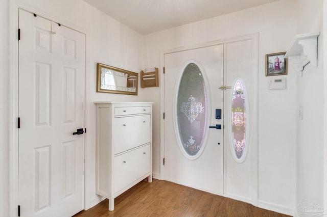 foyer entrance featuring light wood-type flooring