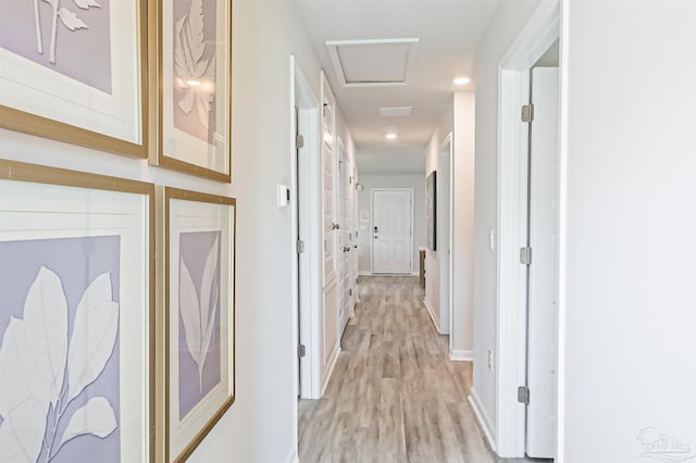 corridor featuring light hardwood / wood-style flooring