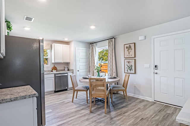 dining area featuring light hardwood / wood-style floors