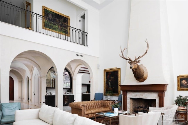 living room with a high ceiling