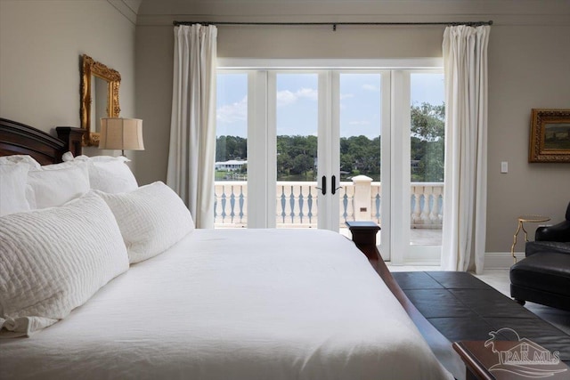 bedroom featuring french doors and access to outside