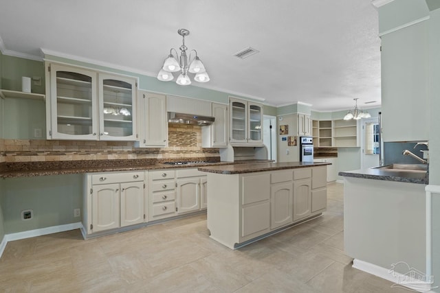 kitchen featuring sink, white cabinetry, decorative light fixtures, a chandelier, and stainless steel appliances