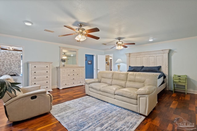 bedroom featuring ornamental molding, ceiling fan, and dark hardwood / wood-style flooring