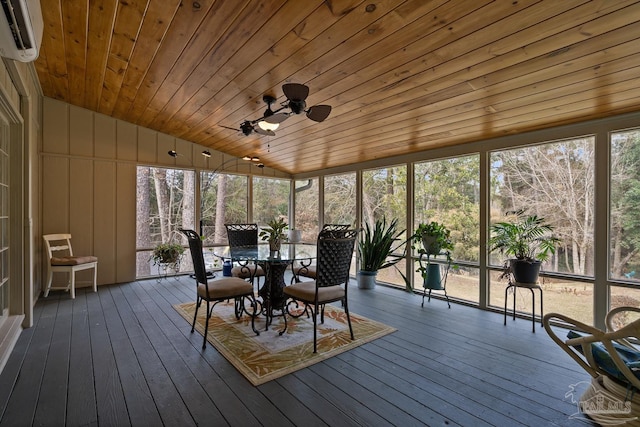 unfurnished sunroom featuring lofted ceiling, plenty of natural light, wooden ceiling, and a wall mounted AC