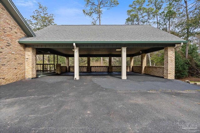 view of parking featuring a carport