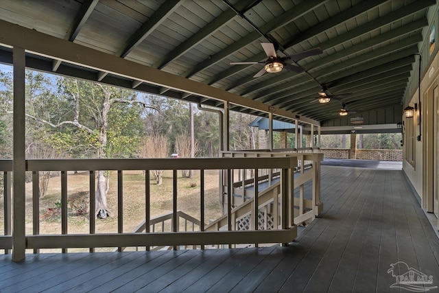 wooden deck featuring ceiling fan