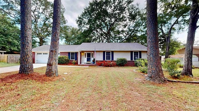 ranch-style house with a front yard, a garage, and a porch