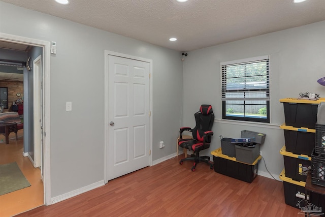 2322 Silversides Loop, Pensacola, FL 32526 - home office featuring wood finished floors, recessed lighting, baseboards, and a textured ceiling