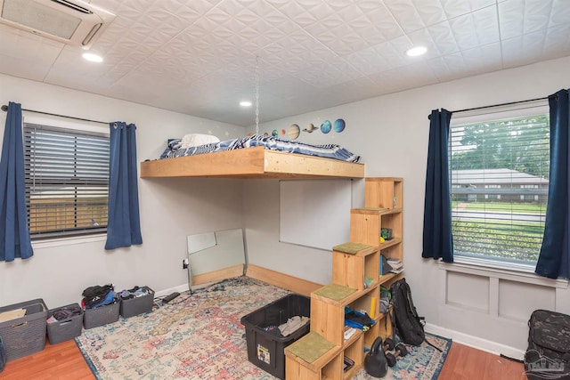 2322 Silversides Loop, Pensacola, FL 32526 - bedroom with wood finished floors, baseboards, and recessed lighting