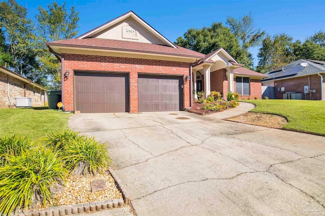 single story home featuring a front yard, central AC, and a garage