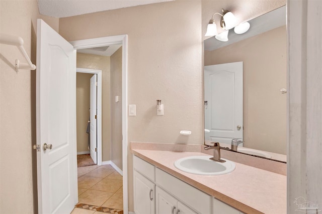 bathroom featuring vanity, toilet, and tile patterned floors