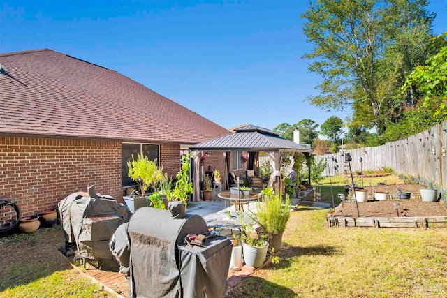 view of yard with a patio and a gazebo