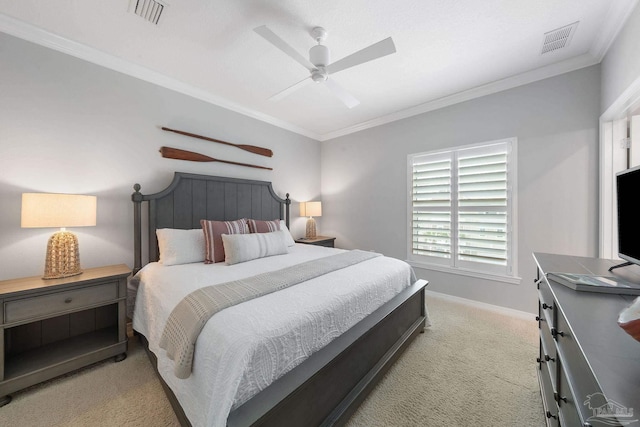 carpeted bedroom with crown molding, visible vents, ceiling fan, and baseboards