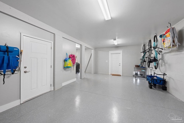 garage featuring baseboards
