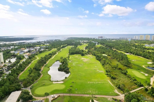 birds eye view of property featuring golf course view and a water view