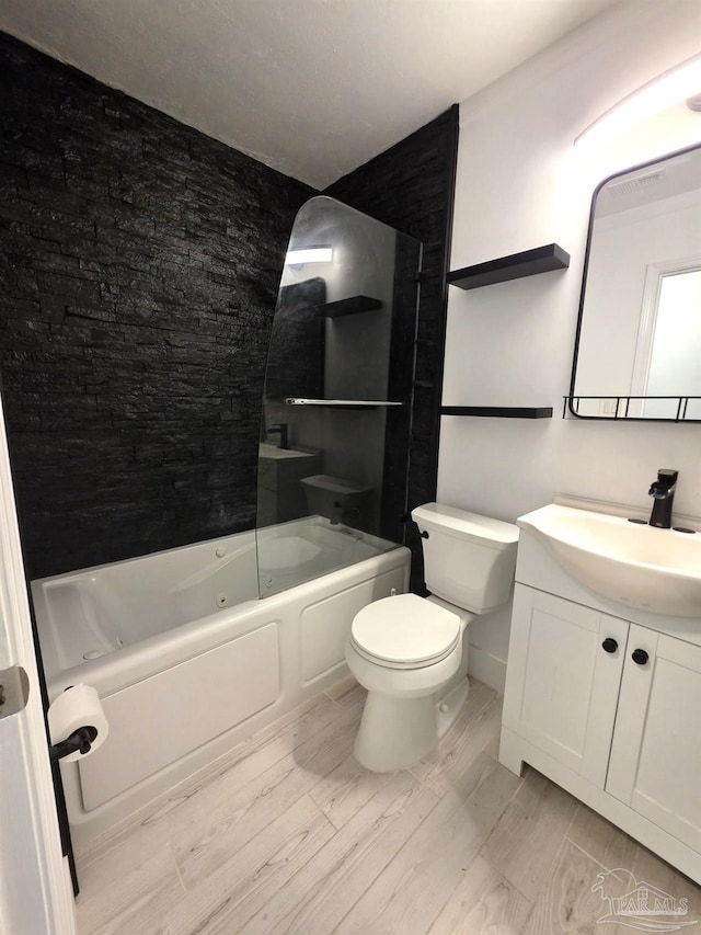 1836 Nestle Dr, Pensacola, FL 32534 - full bathroom featuring toilet, vanity, bathtub / shower combination, and wood finished floors