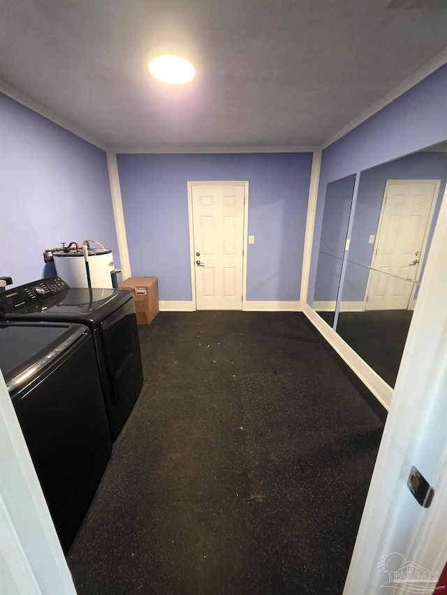 1836 Nestle Dr, Pensacola, FL 32534 - laundry area with washing machine and clothes dryer, baseboards, and laundry area