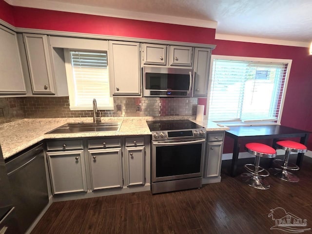 1836 Nestle Dr, Pensacola, FL 32534 - kitchen featuring gray cabinetry, dark wood-style flooring, a sink, and stainless steel appliances