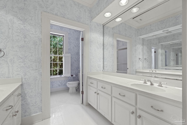 full bath featuring vanity, toilet, and crown molding