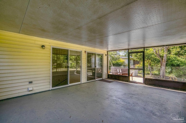 view of unfurnished sunroom