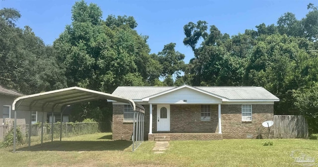 single story home featuring a front lawn and a carport