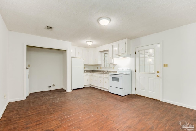 kitchen with white appliances, sink, dark hardwood / wood-style floors, a textured ceiling, and white cabinetry