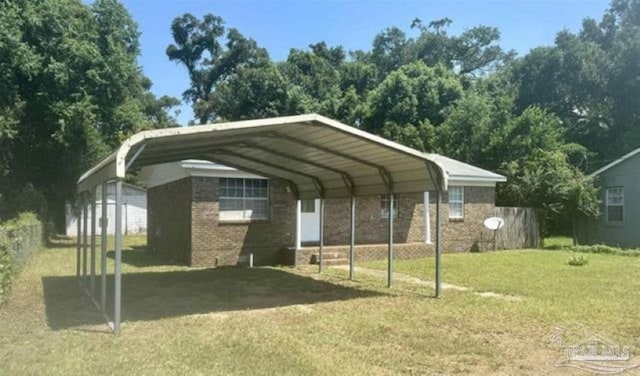 view of parking / parking lot featuring a lawn and a carport