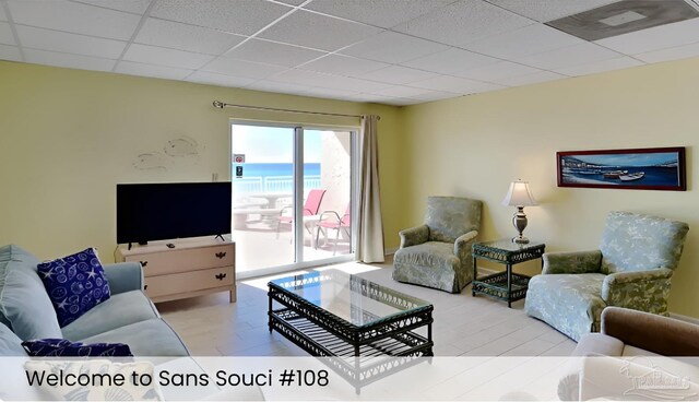 999 Ft Pickens Rd Unit 108, Pensacola Beach, FL 32561 - living area with a drop ceiling