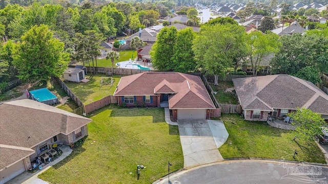 birds eye view of property with a residential view