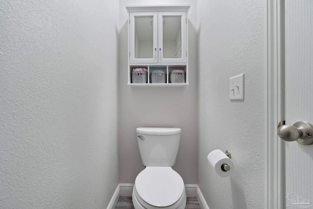 bathroom featuring toilet