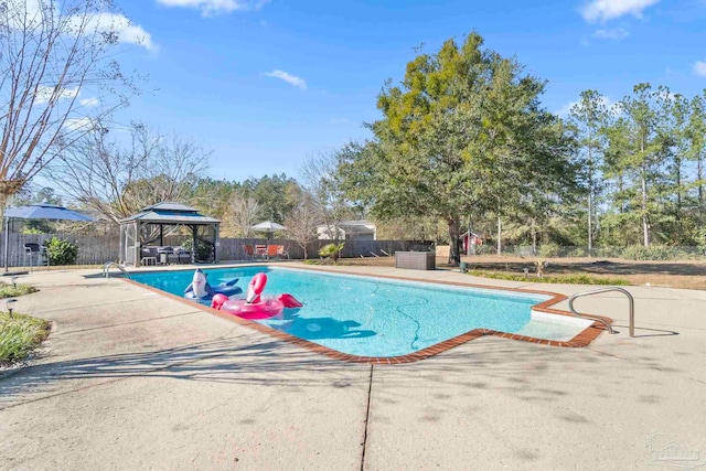 view of pool with a gazebo and a patio