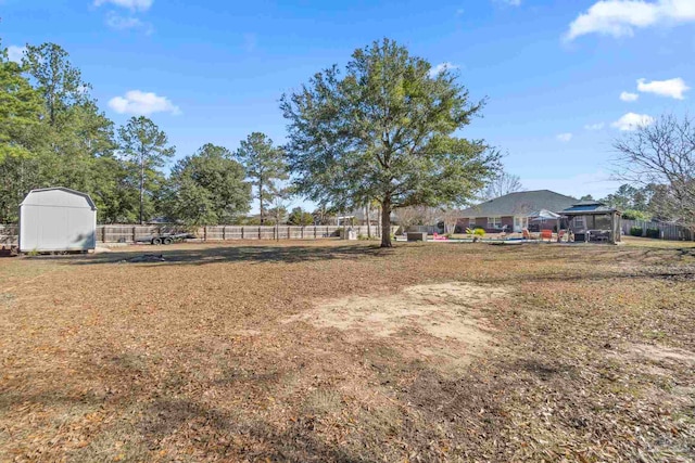 view of yard with a storage shed