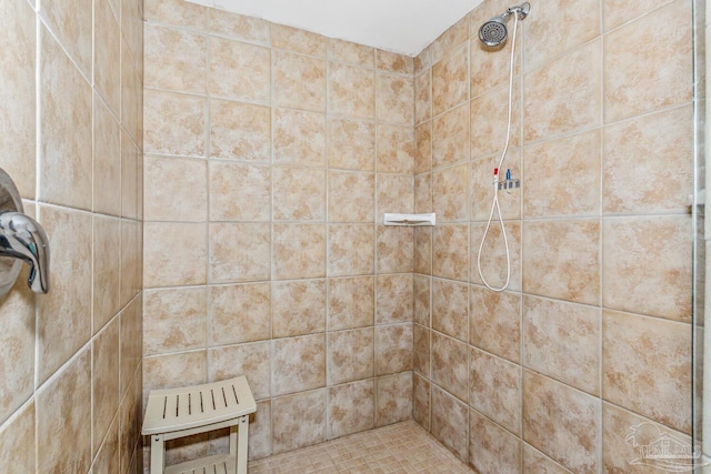 bathroom featuring tiled shower and heating unit