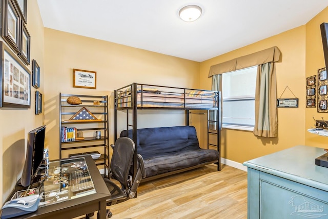 bedroom featuring light wood-type flooring