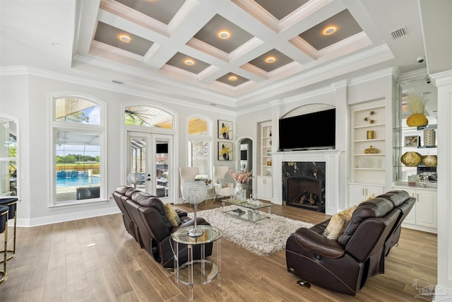 6126 E Fence Rd, Pensacola, FL 32526 - living area featuring a high ceiling, healthy amount of natural light, a fireplace, crown molding, and coffered ceiling