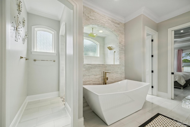 6126 E Fence Rd, Pensacola, FL 32526 - ensuite bathroom with a soaking tub, tile patterned flooring, and crown molding